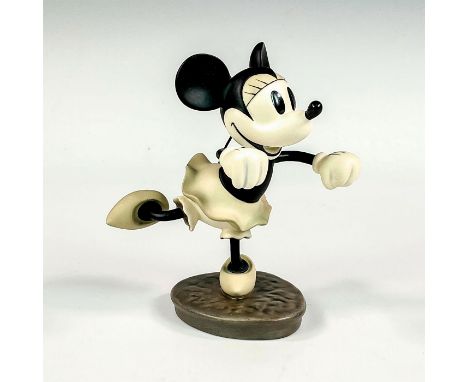 Porcelain figure with matte finish. Depicts vintage gray-scale Minnie Mouse from the 1931 short animated film, The Delivery B