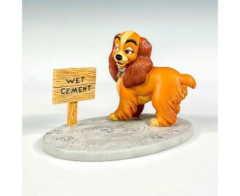 Porcelain figure with matte finish. Depicts Lady from the 1955 film, Lady and the Tramp. Walt Disney Classic Collection backs
