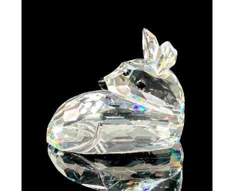 A clear faceted body with a crystal black nose and ears. Swarovski mark. This item has its original box: 3.25"W x 3.5"H. Arti