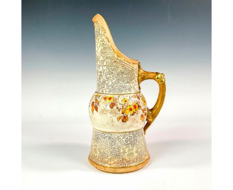 A lovely handled pitcher decorated with exceptional motif and red, yellow, orange flowers; heavy gilt highlight decoration. D