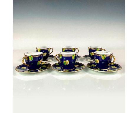 A hand painted set including 6 cups and 6 saucers, decorated with stylized pattern on a cobalt blue ground, gilded rim edge a