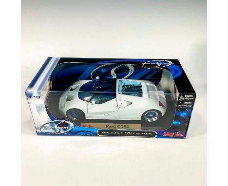 A factory sealed, replica die cast metal coupe designed with detachable parts with white exterior. Includes a black display s