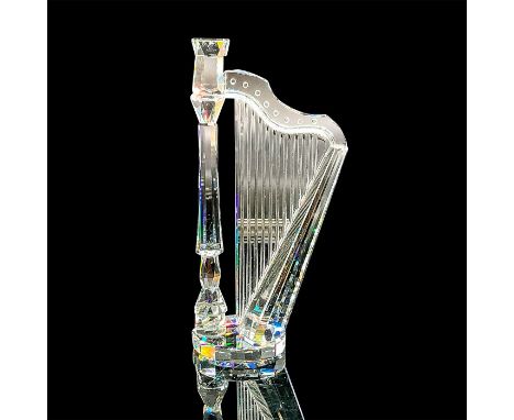 A clear figure of a harp for the "Crystal Melodies" collection. Swarovski mark. This item has its original box: 3.25"W x 6.25