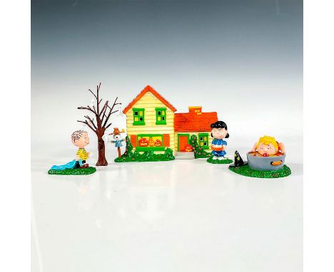 'Peanuts Halloween Party' inspired by the artwork of Charles Schulz. Includes Lucy, Linus, Sally, house, tree, and light fixt