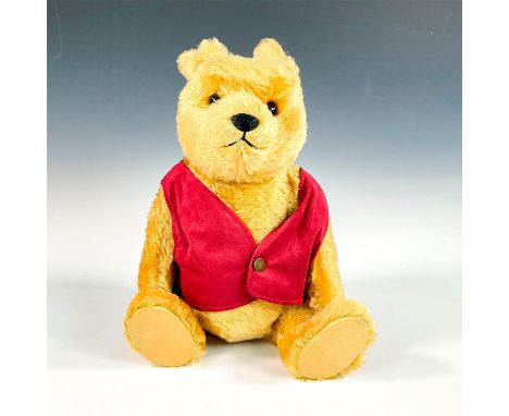 Margarete Steiff GmbH proudly presents Winne the Pooh. Standing 50cm high, this is the largest Steiff has ever created and is