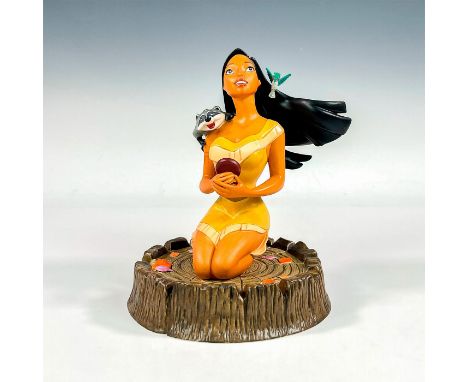 Porcelain figure with matte finish. Tribute series figure; seated Pocahontas holding a compass, Meeko and Flit around her sho
