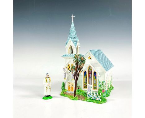 The Happy Easter Church is made of handcrafted and hand-painted ceramic. It features intricate details and architectural elem