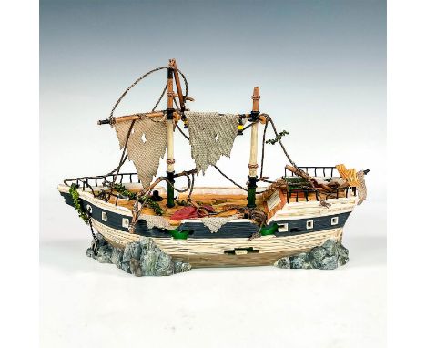 This figure of the "Mary Celeste" depicts a ghostly, haunted ship with eerie details and decorations. like tattered sails, di