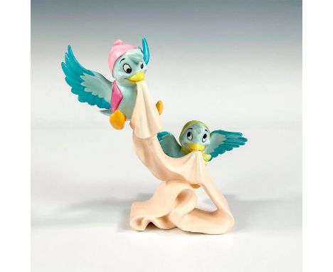 Porcelain figure with matte finish. From the 1950 animated film, Cinderella, depicts two blue birds with a pink sash. Walt Di