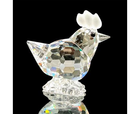 A clear faceted farm bird with black eyes and frosted comb. Swarovski mark. This item has its original box: 3.25"W x 2.5"H. A