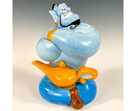 Large ceramic lidded jar modeled as seated Genie gaining with arms folded. Treasure Craft USA impressed to lid. This item has