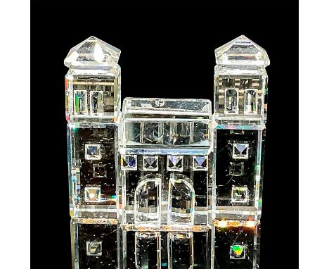Crystal City theme; a clear figure of a building. Swarovski mark. This item has its original box: 3.25"W x 2.5"H. Artist: Gab