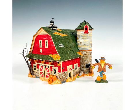 A collectible hand painted ceramic building from the Snow Village Halloween collection. This spooky structure is designed to 