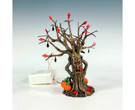 The Lit Spooky Tree is made of hand-painted resin and includes an internal light source that illuminates the tree, creating a
