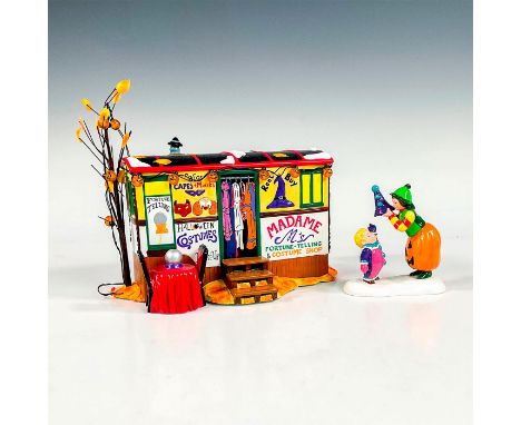 Adorable Halloween costume shop in a caravan, with charming and whimsical displays like a crystal ball for the fortune teller