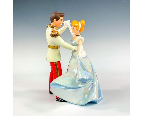 Porcelain figure with matte and luster finish. Depicts Cinderella and Prince Charming from the 1950 animated film. Walt Disne