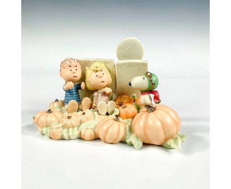 40th anniversary figure inspired by the artwork of Charles Schulz; fine china with 24K gold. Depicts the comical scene from 1