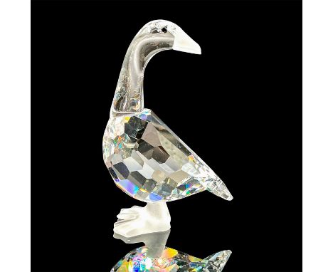 A clear faceted body goose with a black eyes. Frosted feet and closed beak. Swarovski mark. This item has its original box: 3