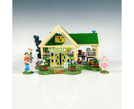 The Original Snow Village series; a ceramic figure of an adorable building with an Easter Lily Special sale. Includes 3 piece