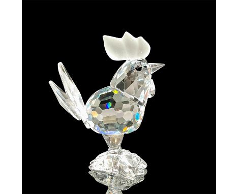 A clear faceted farm bird with black eyes and frosted comb. Swarovski mark. This item has its original box: 3.25"W x 2.5"H. I