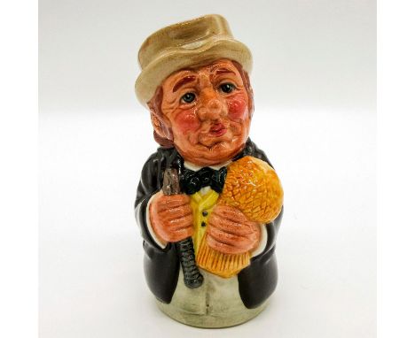 Dark brown coat; cream trousers; light brown hat.Series: The Doultonville Collection. Royal Doulton backstamp. Artist: Willia