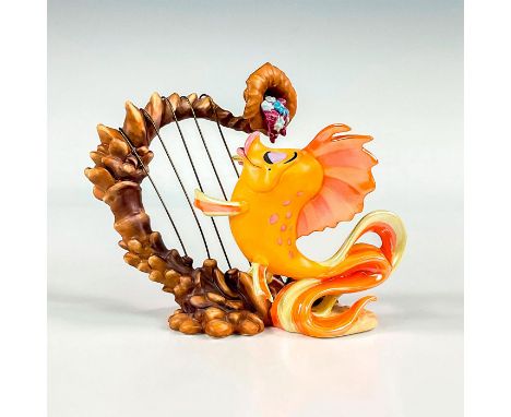 Porcelain figure with matte and luster finish. Depicts the harp playing Carp from the 1989 animated film, The Little Mermaid.