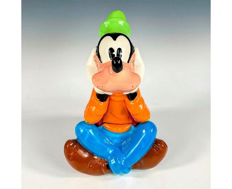 A large ceramic lidded jar modeled as Goofy seated smiling with hands by his ears. Disney Mexico backstamp. This item has its