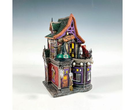 The Original Snow Village series and 30th Anniversary Collectors' Surprise. A ceramic figure in a semi-glossy finish. Depicts