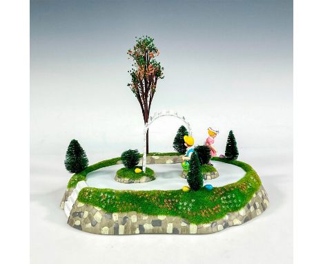 The hunt is on as these animated children move about the yard enjoying one of springtime's most delightful traditions of sear