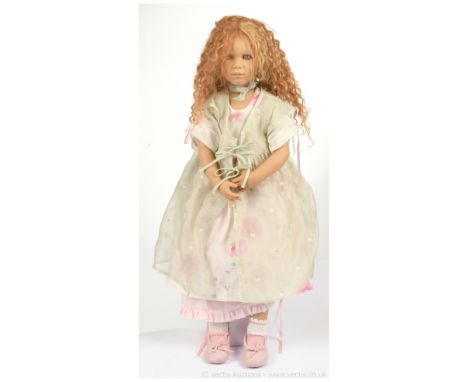 Annette Himstedt Puppen Kinder Krissi 2 vinyl artist designed doll, 2001, with leaflet, some fading to clothing, both shoes h