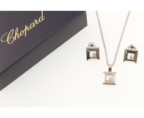 An 18ct white gold CHOPARD Happy Diamonds collection earring, pendants & chain set (Serial No 3059166) with original box & gu
