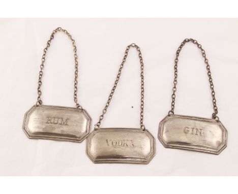 Three silver H/M modern wine labels, VODKA, GIN & RUM, Sheffield 1973/4, together approx 28.7gms