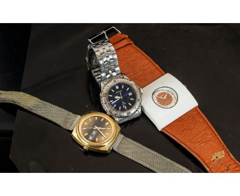 Three Fashion Watches, comprising a Timex Gents watch with a mesh strap, an Accurist gents watch with a black face and chrome