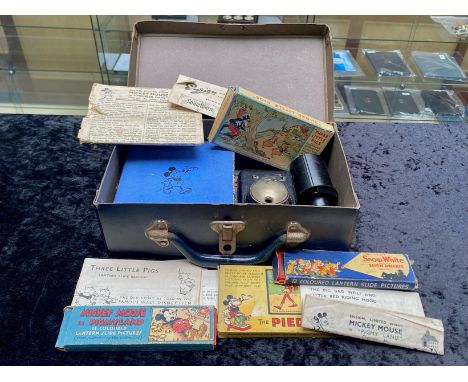 Miniature Magic Lantern, together with various Disney slides, to include Mickey Mouse, Snow White, Three Little Pigs (one pla