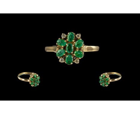 14ct Gold Attractive Emerald and Diamond Set Ring marked 14ct to shank. Emeralds and diamonds of good colour and clarity. Rin