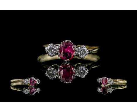 18ct Gold Attractive 3 Stone Ruby and Diamond Set Ring. The Ruby and Diamonds of Good Colour / Clarity. Ring Size Q - R. Weig