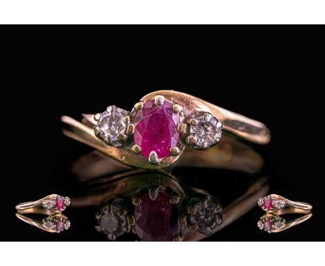 18ct Gold - Attractive 3 Stone Ruby and Diamond Set Ring. Full Hallmark to Shank. Ring Size K. Weight 2,1 grams. Shank / Sett