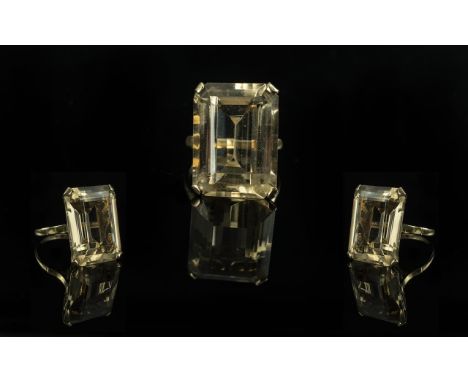 Ladies - Large and Impressive 9ct Gold Single Stone Citrine Set Ring. Marked 9ct to Shank. The Large Emerald Cut Citrine of S