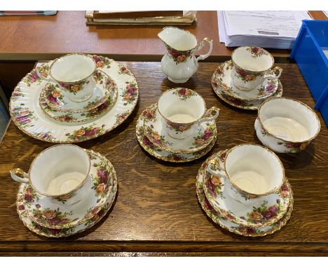 A Royal Albert Old Country Roses Tea Service comprising, one dinner plate, five cups and saucers, milk jug and sugar bowl. 