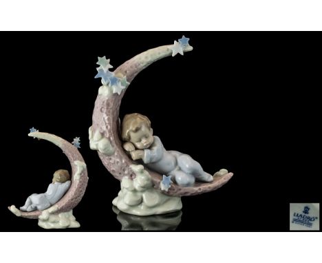 Lladro Figure - 'Heavenly Slumber'  No. 6479, glossy porcelain baby figurine asleep on a crescent moon decorated with stars a