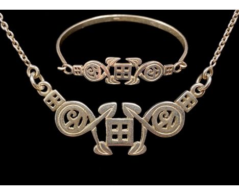 Silver Matching Necklace and Bracelet, comprising a bangle bracelet with decorative front panel of square and circular Celtic