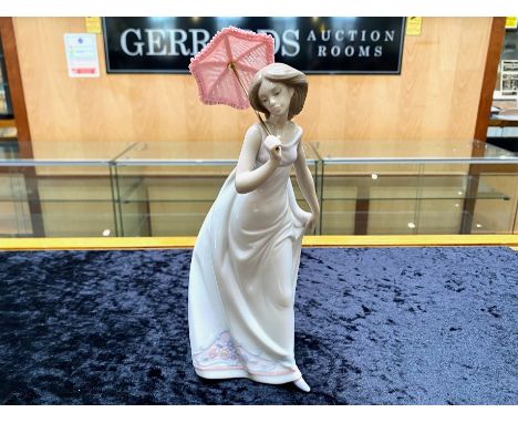 Collection of Lladro Figures, including a Goose No. 7689, Girl with Rooster No. 4677, Dutch Milk Boy with Pails No. 4811, Yaw