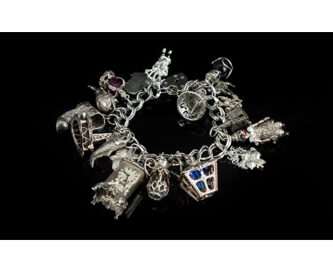 Excellent Vintage Sterling Silver Charm Bracelet - Loaded with Over 20 Charms. All Marked for Silver. Comprises Old Boot, Gra