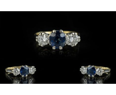 18ct Gold &amp; Platinum 3 Stone Sapphire &amp; Diamond Set Ring, marked 18ct and Platinum to interior of shank.  The central