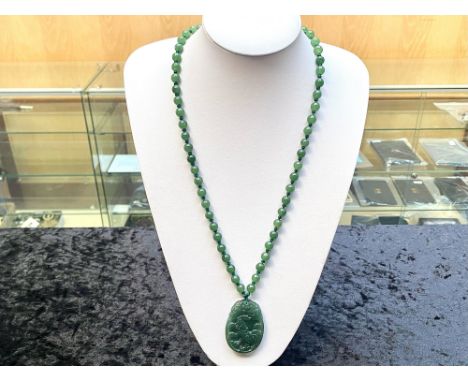 Green Jade Chinese Zodiac Pendant Necklace, the pendant carved with the image of the Chinese Zodiac sign of the Rooster, susp