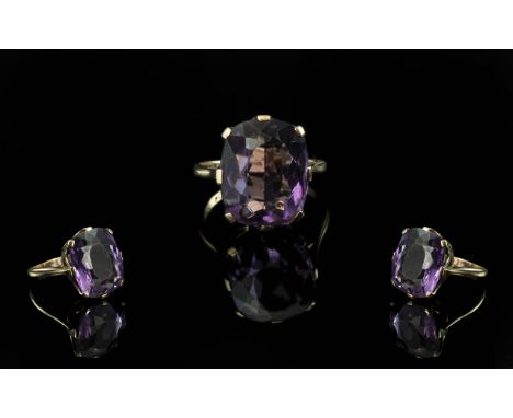 Ladies 9ct Gold Attractive Single Stone Amethyst Set Ring. Marked 9ct to Interior of Shank. The Large Faceted Amethyst of Dee