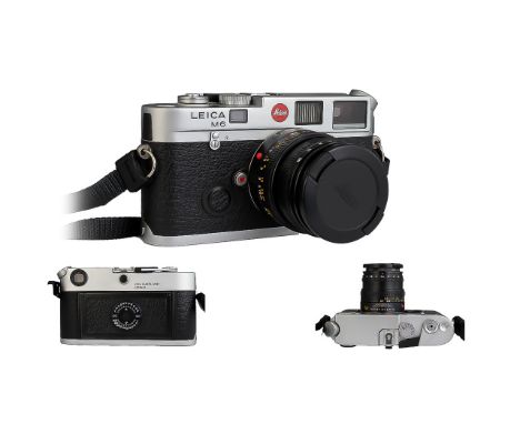 A Leica M6 Camera, chrome, Leica Germany, serial no 2002525, Comes With Camera Case And Two Lenses, Leica Summicron-M 1:2/50 