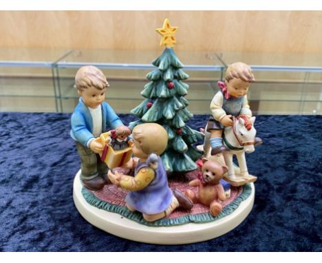 Hummel Christmas Figurine, 'The Magic of Christmas' measures 7'' x 6''.  Made under licence by Danbury Mint.