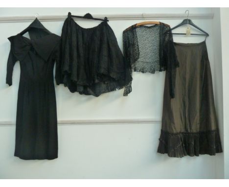 A black cotton dress with front bow, a long vintage rayon petticoat and a lace skirt and corset top with bolero jacket. (5)  