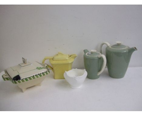 A quantity of pottery to include two twintone Poole Pottery teapots, a Coalport China pot, G. Clews and Co. yellow teapot, a 